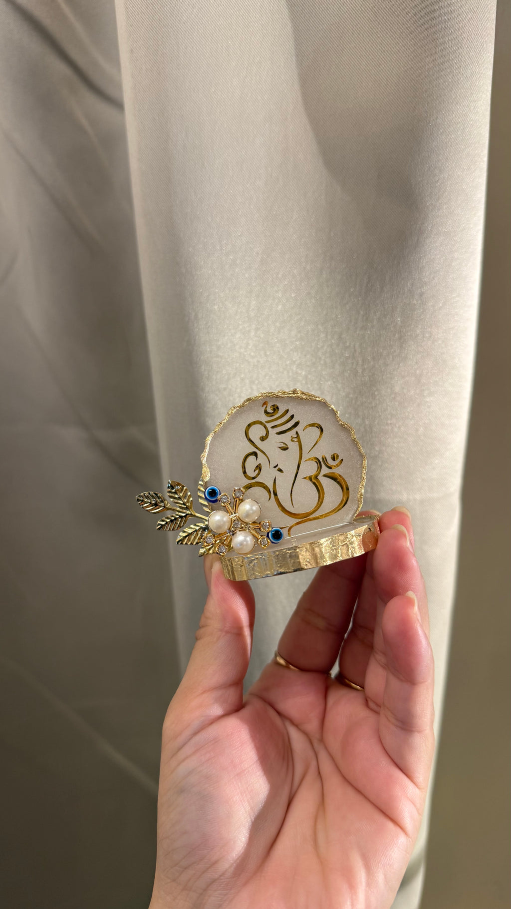 Evil eye ivory ganpati