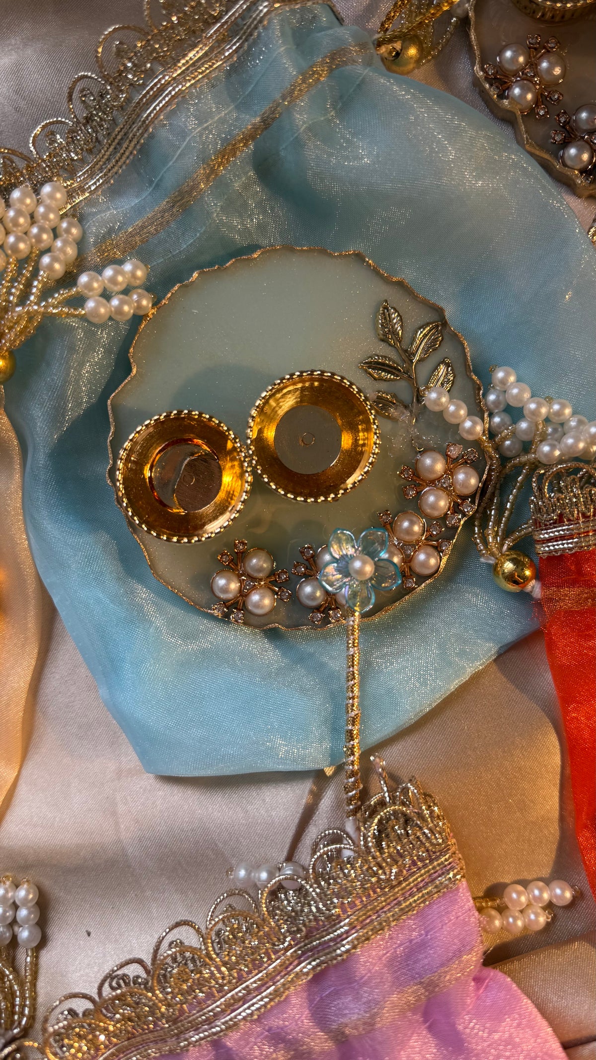 Mini thali+teeka applicator set in a potli
