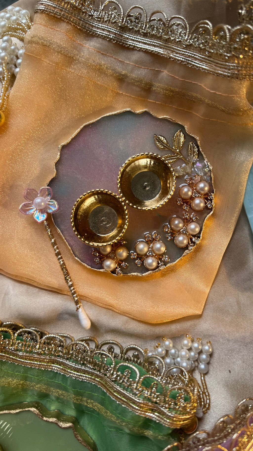 Mini thali+teeka applicator set in a potli