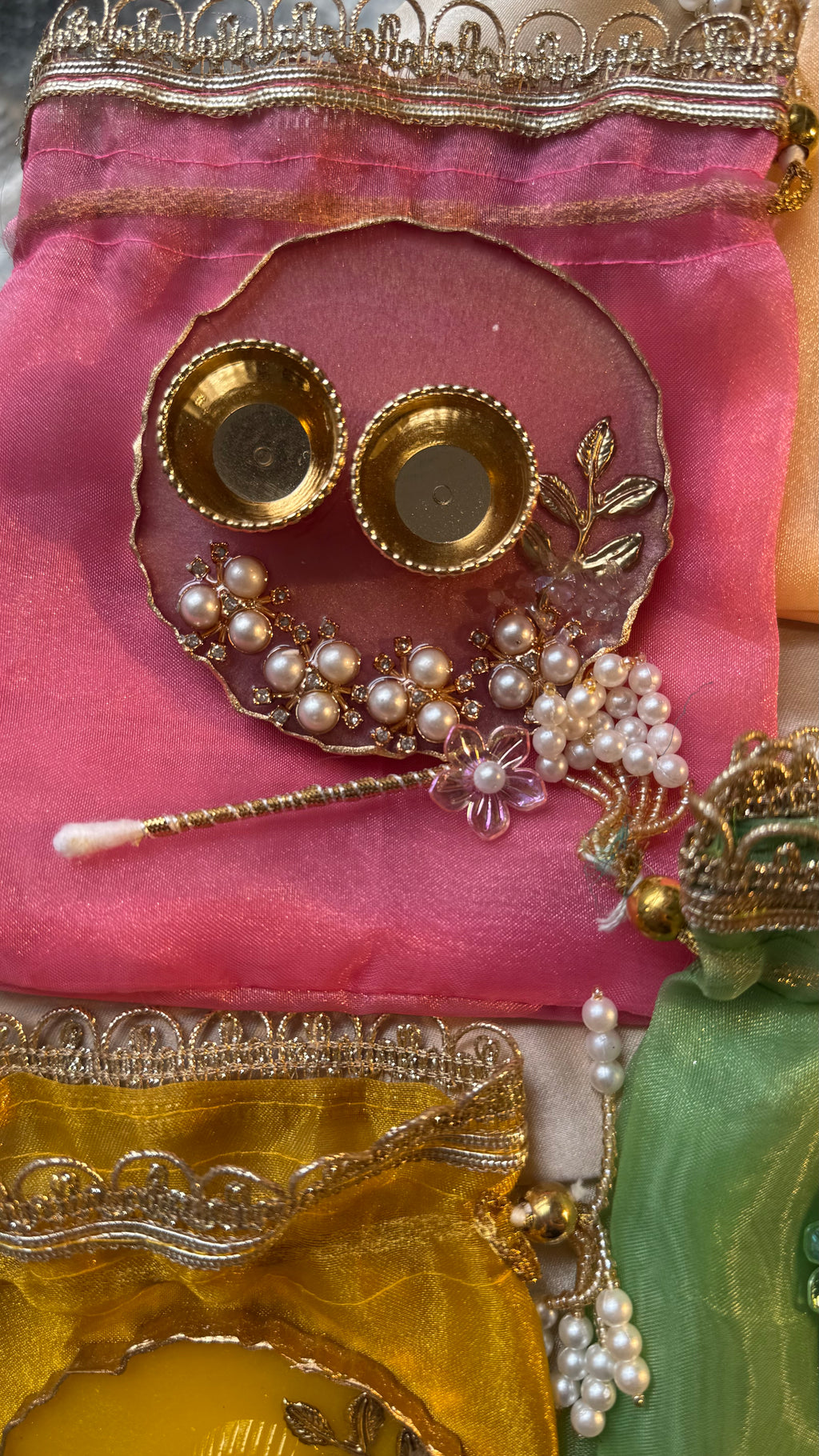 Mini thali+teeka applicator set in a potli